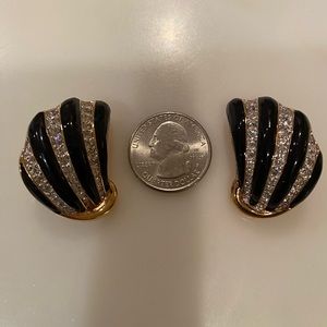 Judith Leiber clip on earrings. Black and gold color. Signed on  the back.